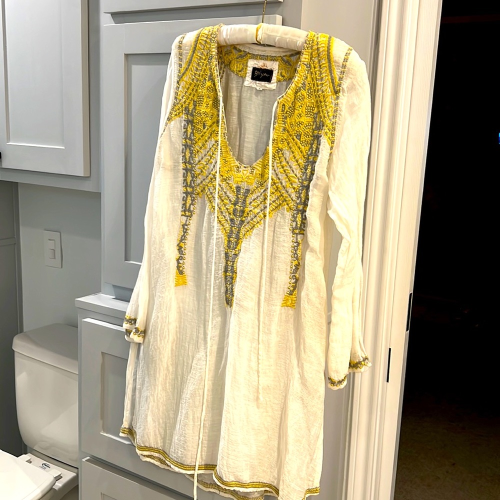 Johnny was BiYa brand tunic.